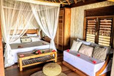 Dormitorio y sala de estar