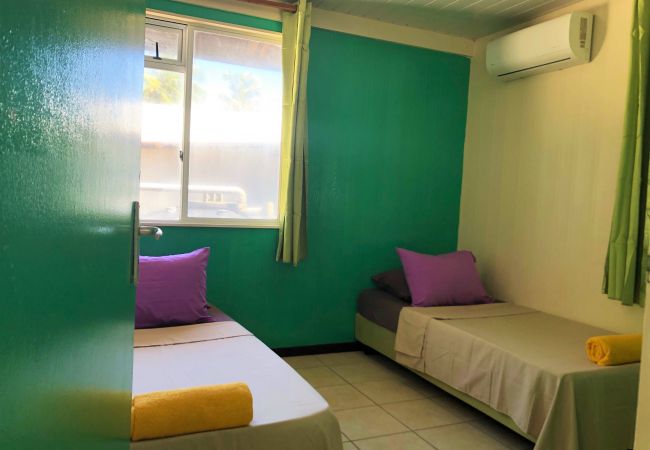 Chambres d'hôtes à Tuherahera - TIKEHAU - Hina Green Room  Chambres d'hôtes à Tuherahera - TIKEHAU - Hina Green Room